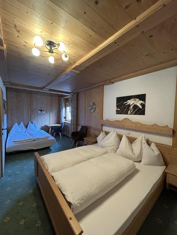 Postel nebo postele na pokoji v ubytování Haus am Sonnenhang