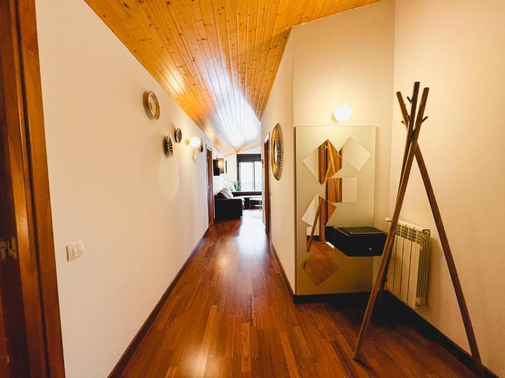 Postel nebo postele na pokoji v ubytování Narcis, Atico en El Tarter, Zona Grandvalira