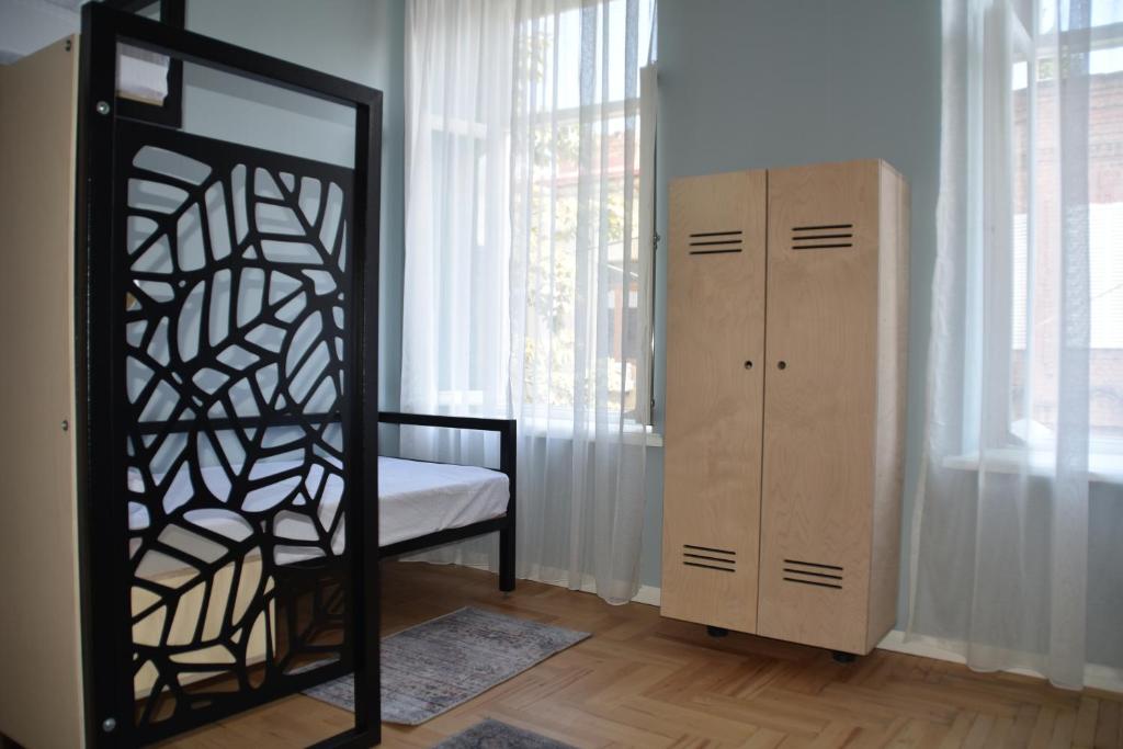 Postel nebo postele na pokoji v ubytování Communa Good Vibes