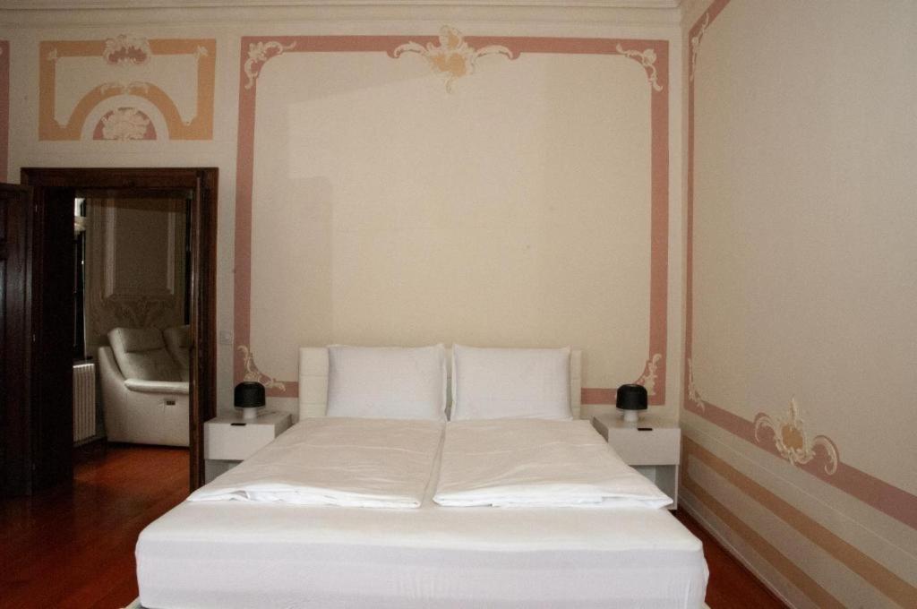 Postel nebo postele na pokoji v ubytování Albergo Ristorante della Posta