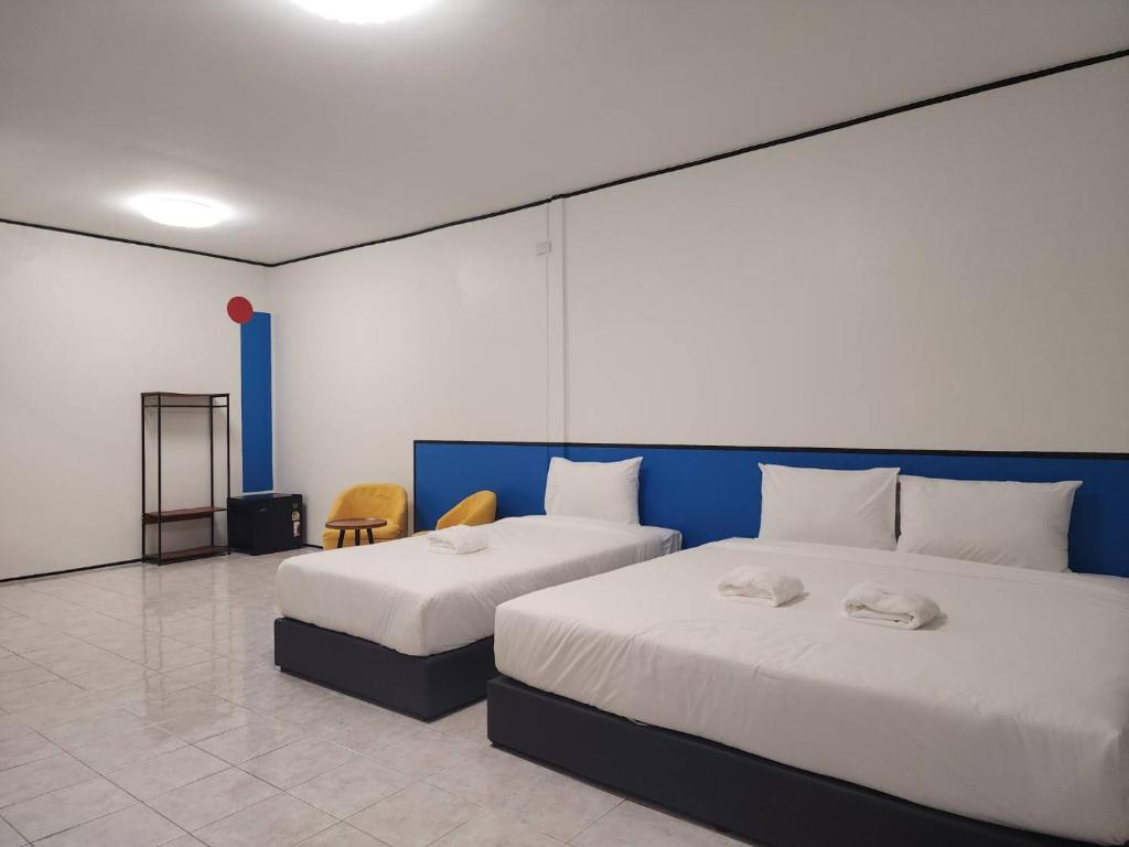 Postel nebo postele na pokoji v ubytování RYB Hostel Phuket