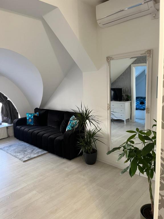 Posezení v ubytování Picúr és Manó Apartmanja