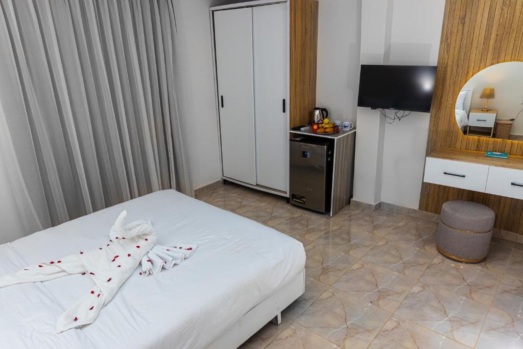 Kuchyň nebo kuchyňský kout v ubytování Pyramids Land Suites