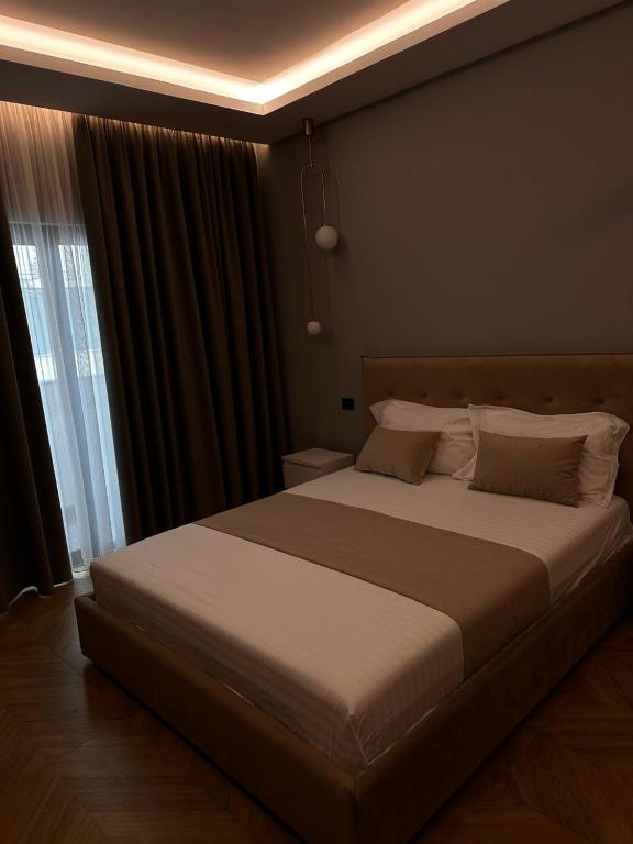 Postel nebo postele na pokoji v ubytování Diamond Hotel