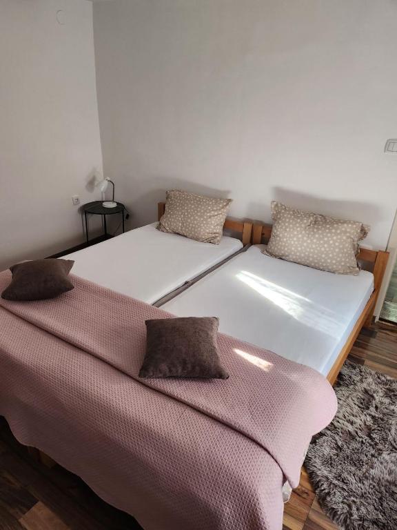 Postel nebo postele na pokoji v ubytování Tića3