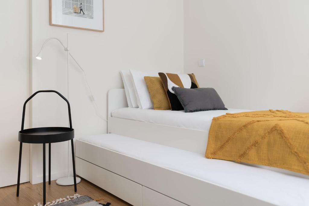 Postel nebo postele na pokoji v ubytování AgapeStay Family House