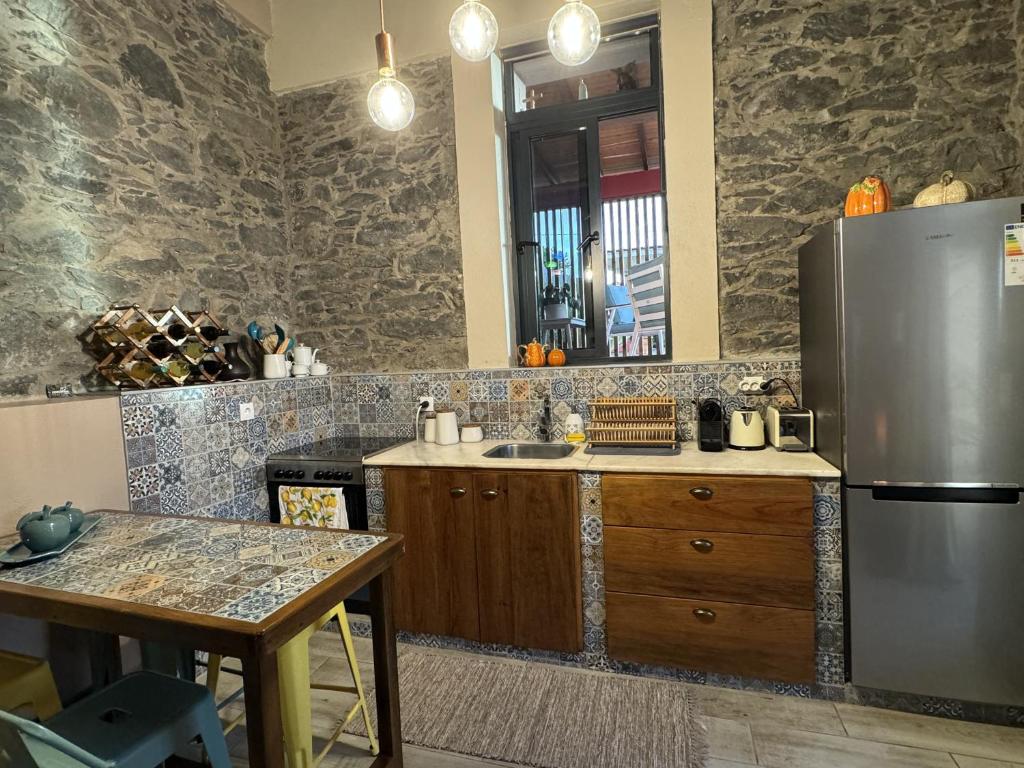 Kuchyň nebo kuchyňský kout v ubytování Victoria Tiny Stone House