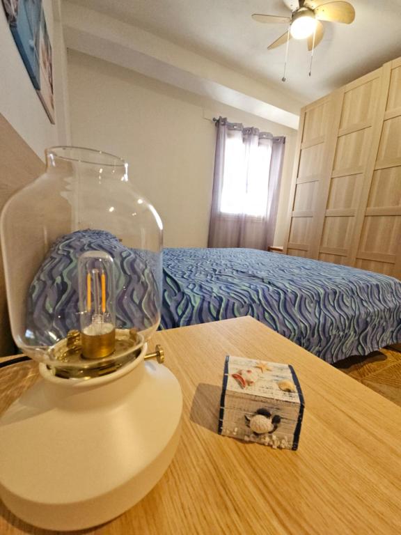 Voodi või voodid majutusasutuse Chalet Tiziana ~ Una veranda sul mare ~ toas