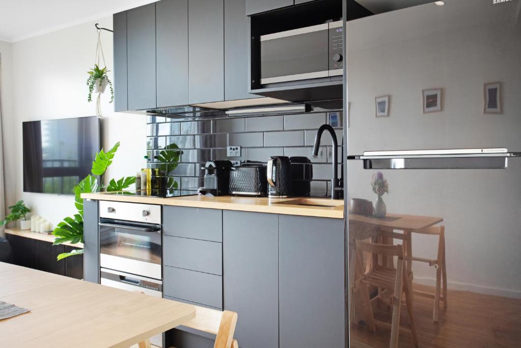 City Escape Apt with Views, Pool - Gym - Resim 25