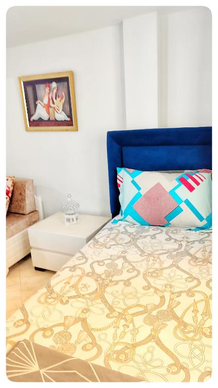Postel nebo postele na pokoji v ubytování Cosy Duplex" Sidi Bou Said "
