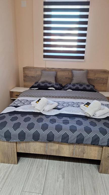 Postel nebo postele na pokoji v ubytování Apartments Green Beograd