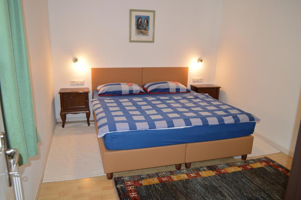 Postel nebo postele na pokoji v ubytování Appartements Strasser Angelika