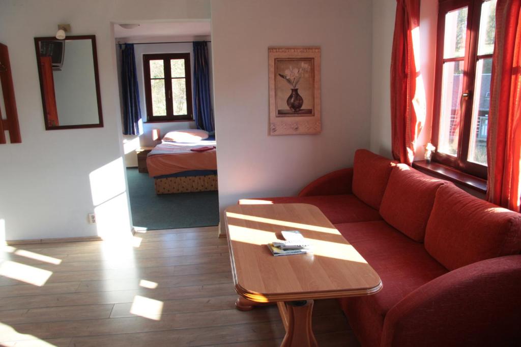 Posezení v ubytování Apartmany Chribska
