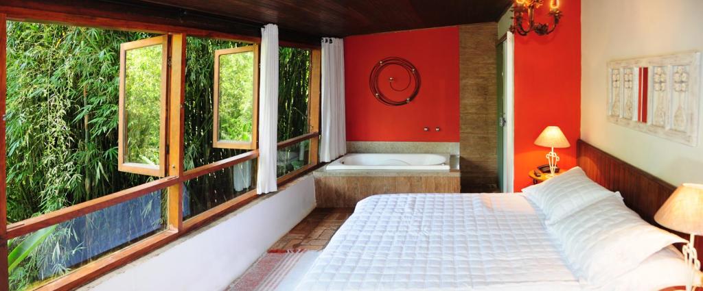 Postel nebo postele na pokoji v ubytování Hotel Daniela