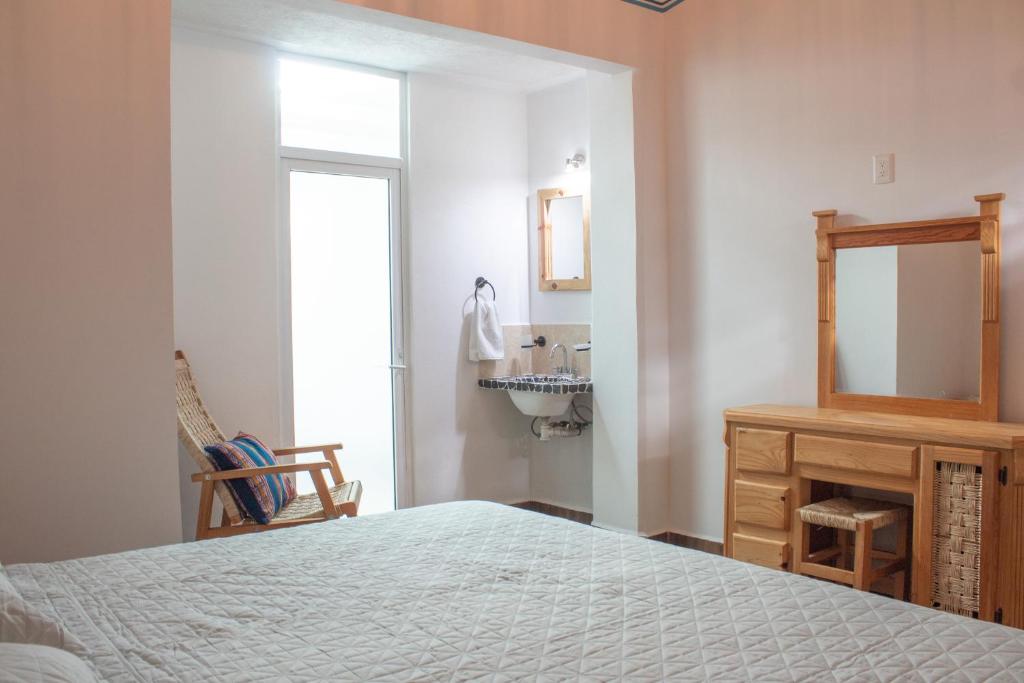 Letto o letti in una camera di Los Temazcales de Xochitepec