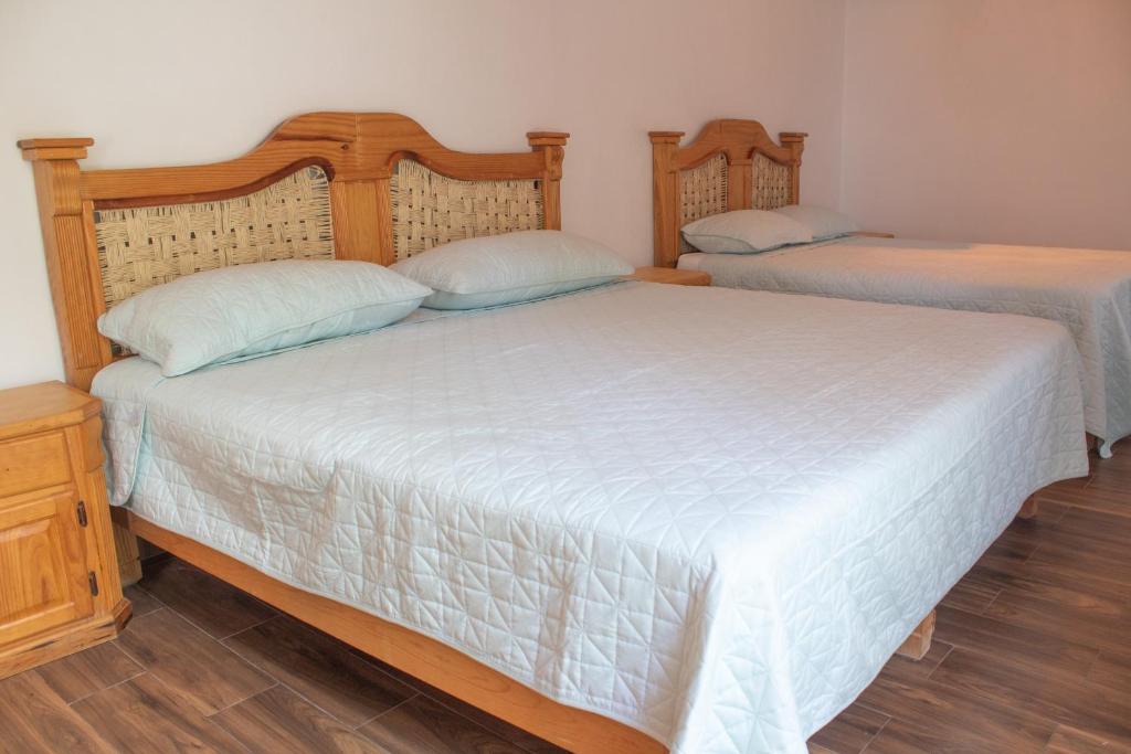 Letto o letti in una camera di Los Temazcales de Xochitepec