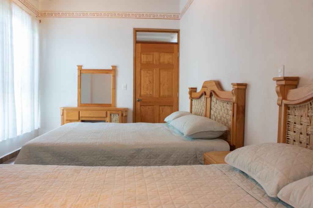 Letto o letti in una camera di Los Temazcales de Xochitepec