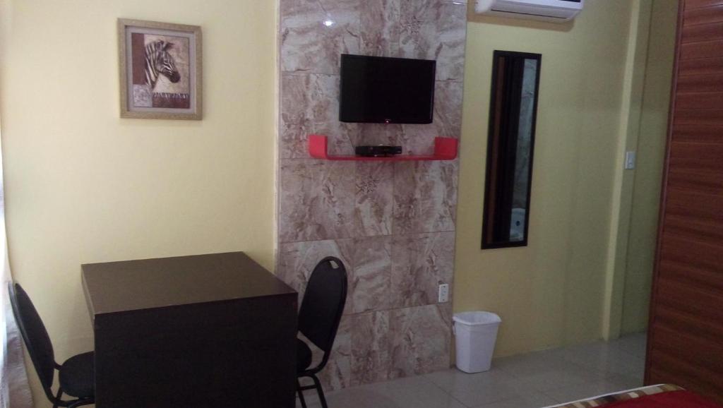TV a/nebo společenská místnost v ubytování Hotel Boutique Malibu Los Sueños