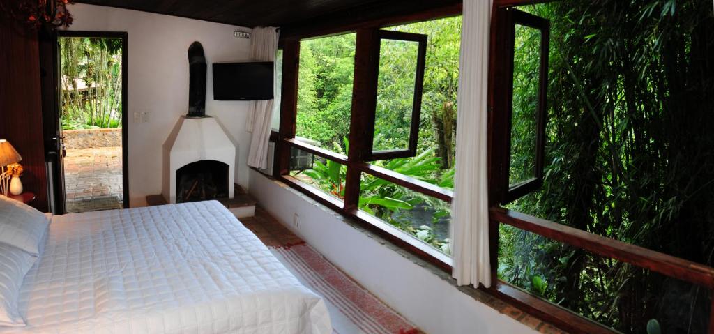 Postel nebo postele na pokoji v ubytování Hotel Daniela