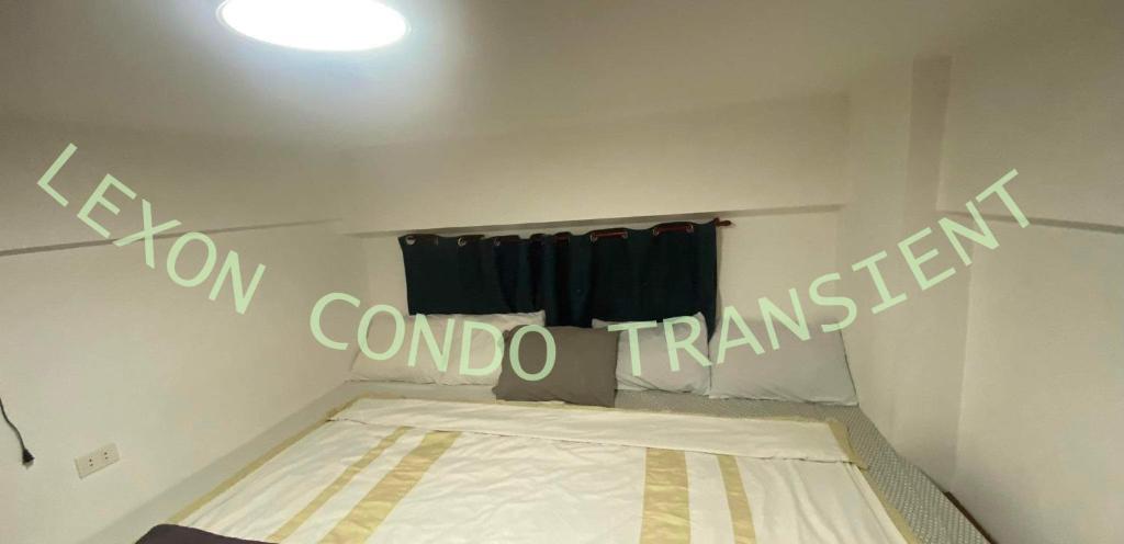 Postel nebo postele na pokoji v ubytování Lexon- Marx Condotel