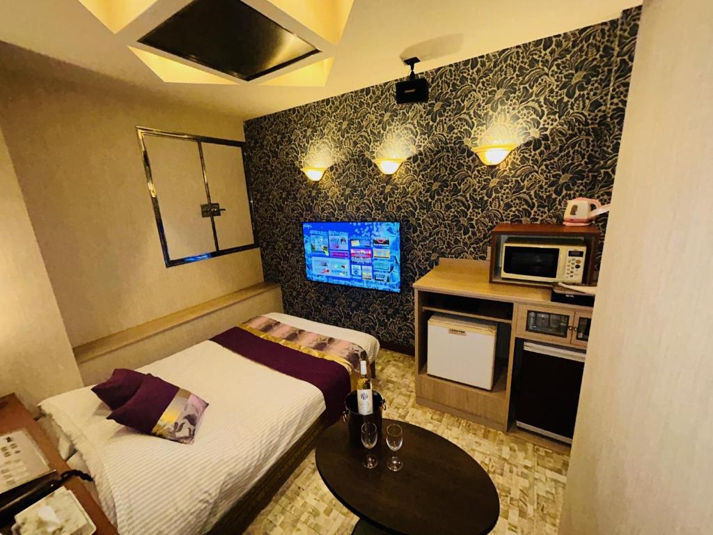 Kuchyň nebo kuchyňský kout v ubytování Hotel Crystal -adult only-