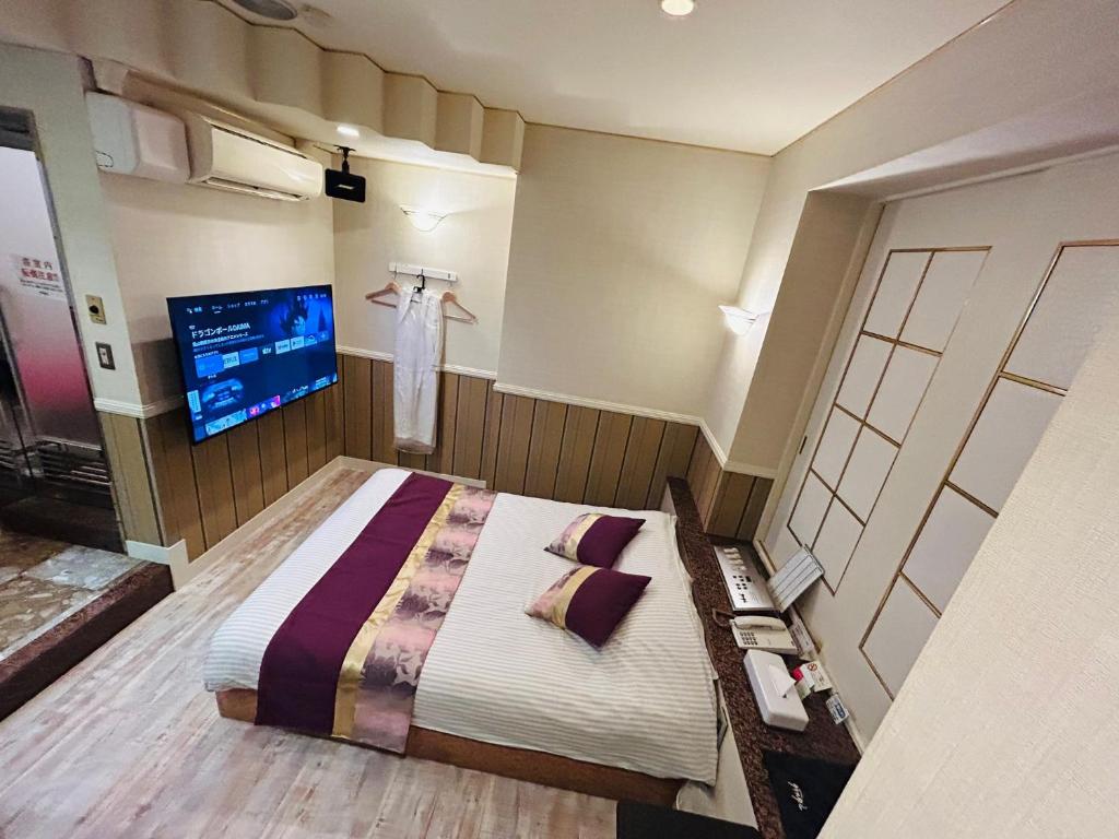 Postel nebo postele na pokoji v ubytování Hotel Crystal -adult only-