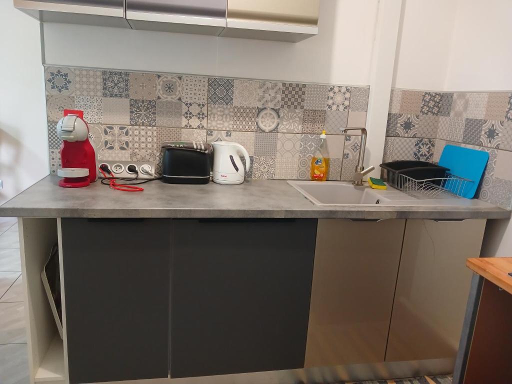 Kuchyň nebo kuchyňský kout v ubytování F2 My PLACE TO REST
