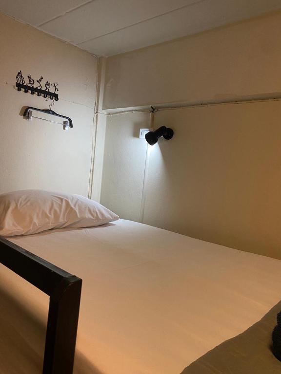 Postel nebo postele na pokoji v ubytování Beach House 24