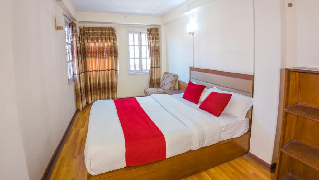 Postel nebo postele na pokoji v ubytování Durbar Guest House