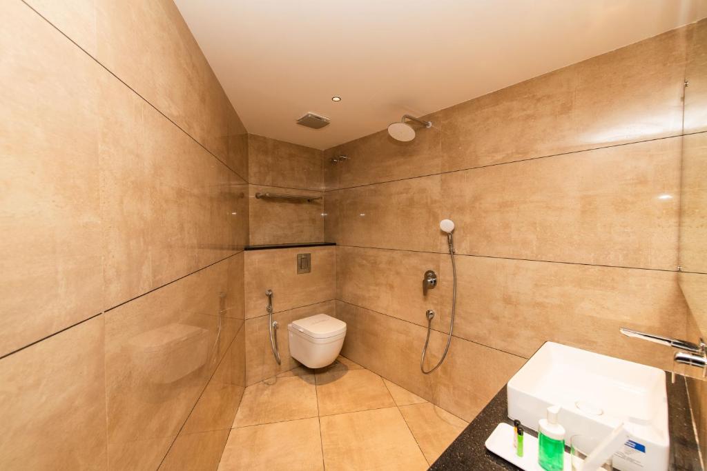 Koupelna v ubytování Hotel Mysore Radiance