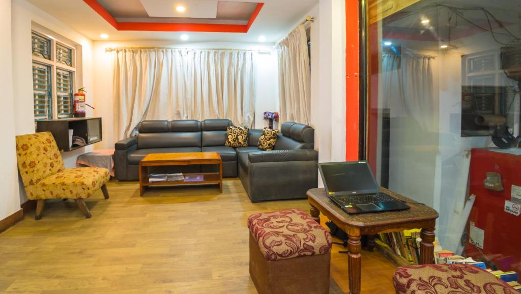 TV a/nebo společenská místnost v ubytování Durbar Guest House