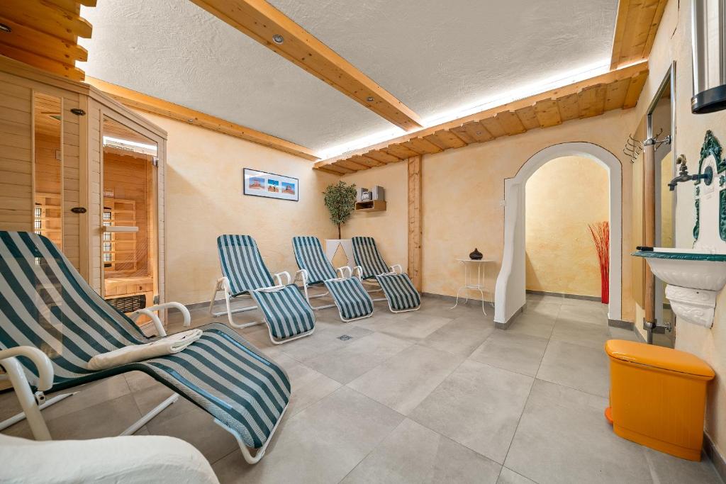 TV a/nebo společenská místnost v ubytování Hotel Ramsaueralm