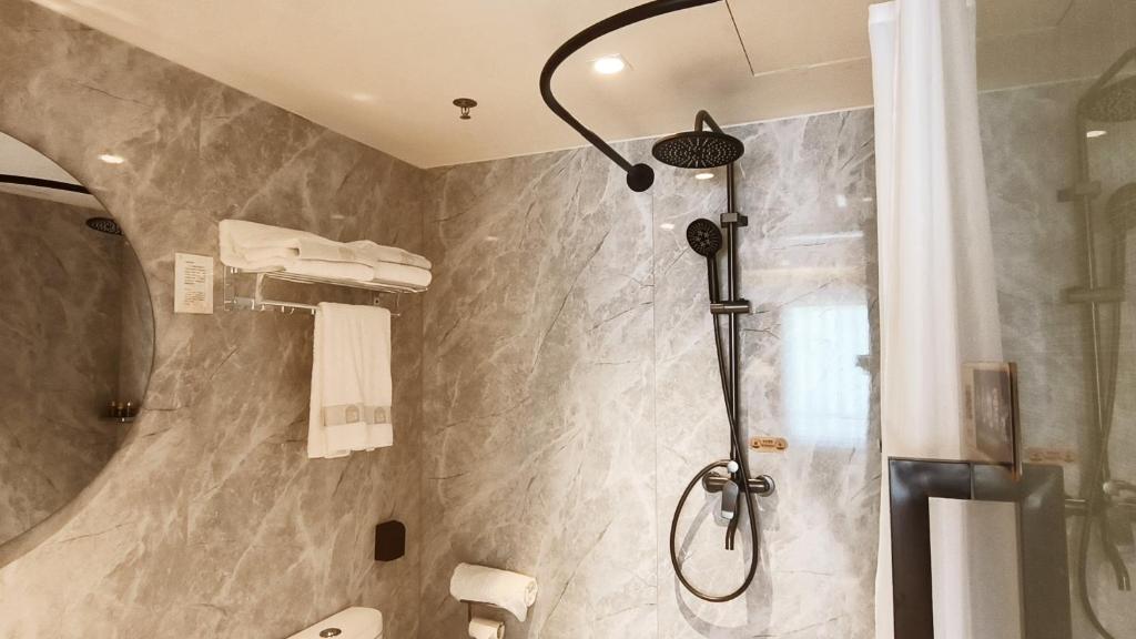 Koupelna v ubytování Yun Qi Hotel