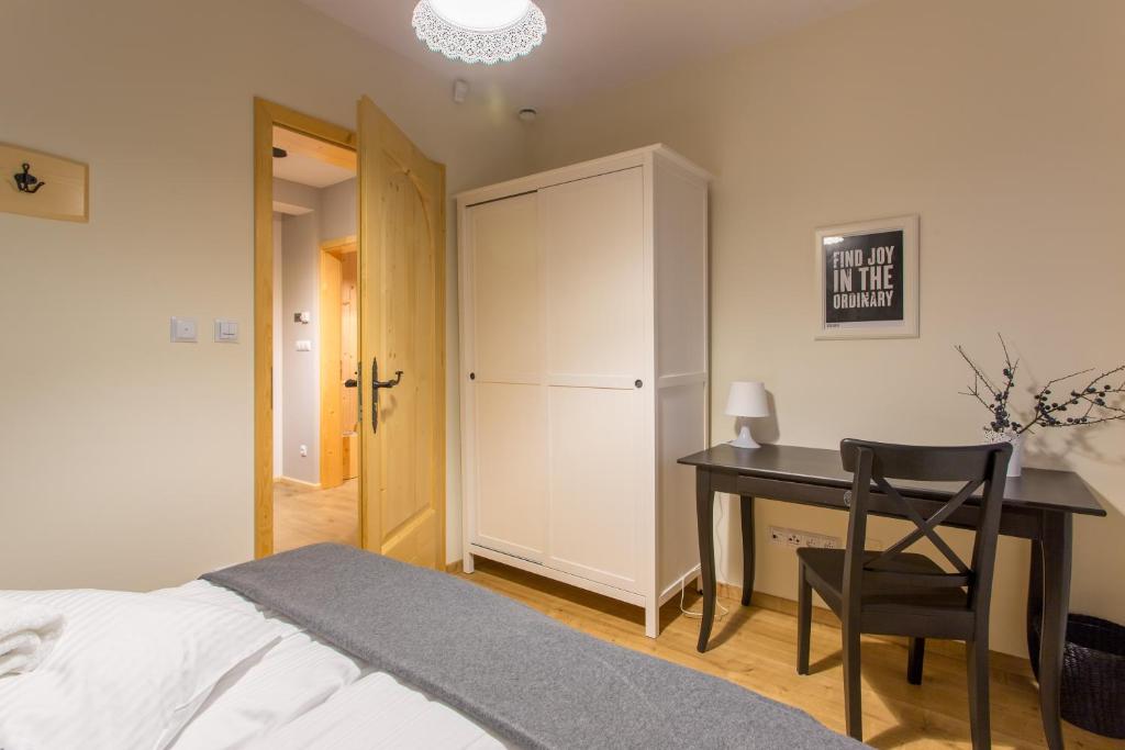 Letto o letti in una camera di Osada Cztery Pory Roku Czorsztyn
