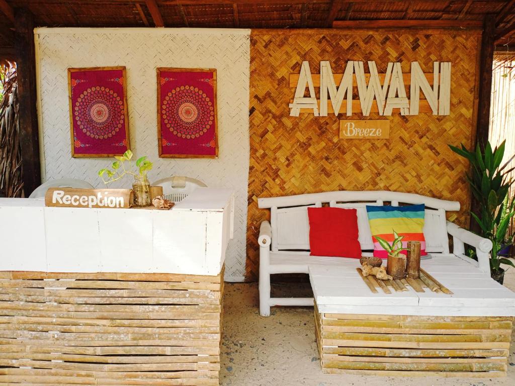 Postel nebo postele na pokoji v ubytování Amwani Breeze