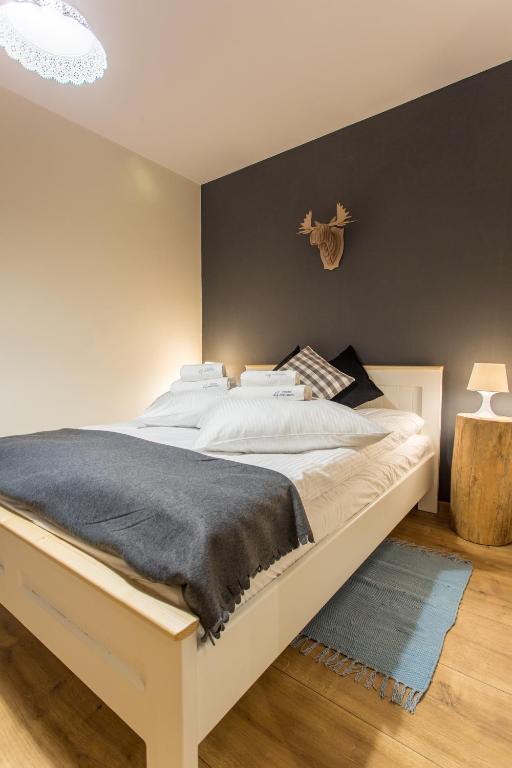 Letto o letti in una camera di Osada Cztery Pory Roku Czorsztyn