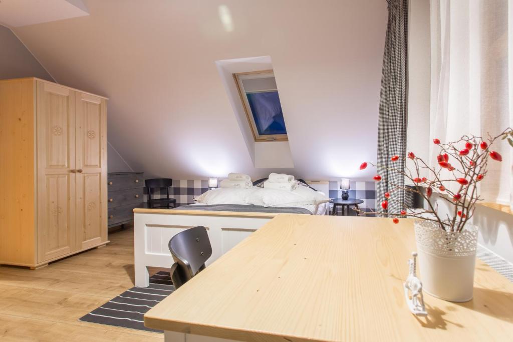 Letto o letti in una camera di Osada Cztery Pory Roku Czorsztyn