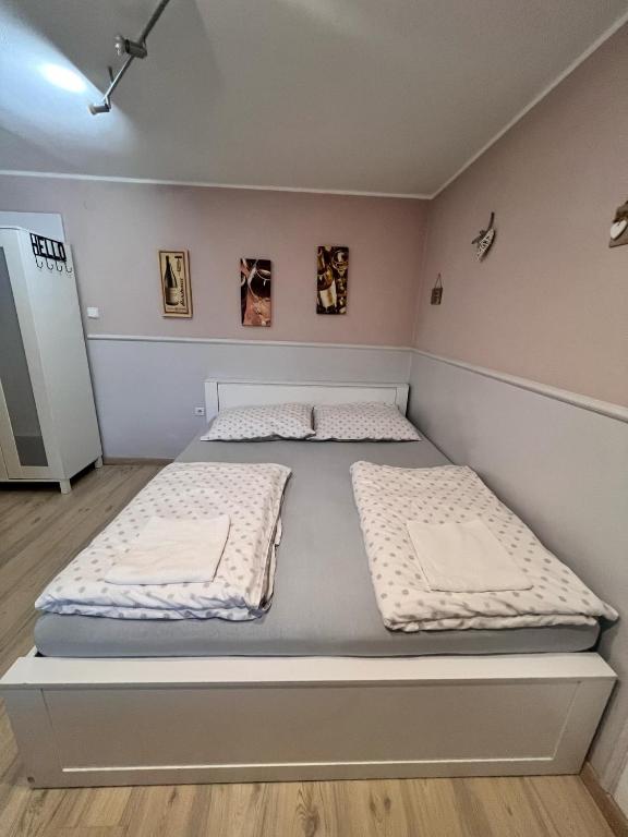 Postel nebo postele na pokoji v ubytování Ubytovani Na Hrazi 91