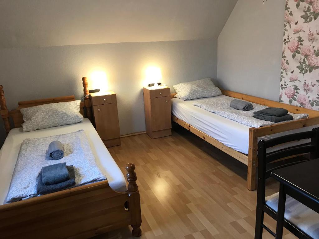 Postel nebo postele na pokoji v ubytování Pension Deinhardt