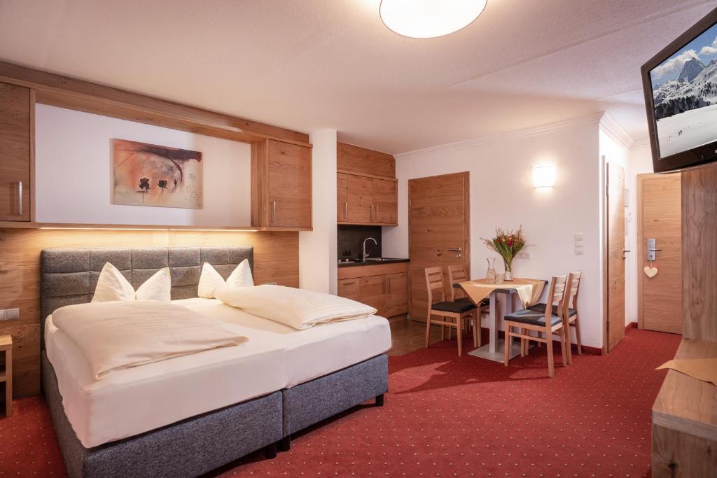 Postel nebo postele na pokoji v ubytování Hotel Kroneck