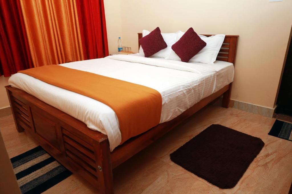 Postel nebo postele na pokoji v ubytování Jia Hill view rooms vagamon