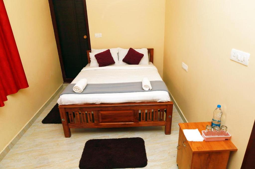 Postel nebo postele na pokoji v ubytování Jia Hill view rooms vagamon