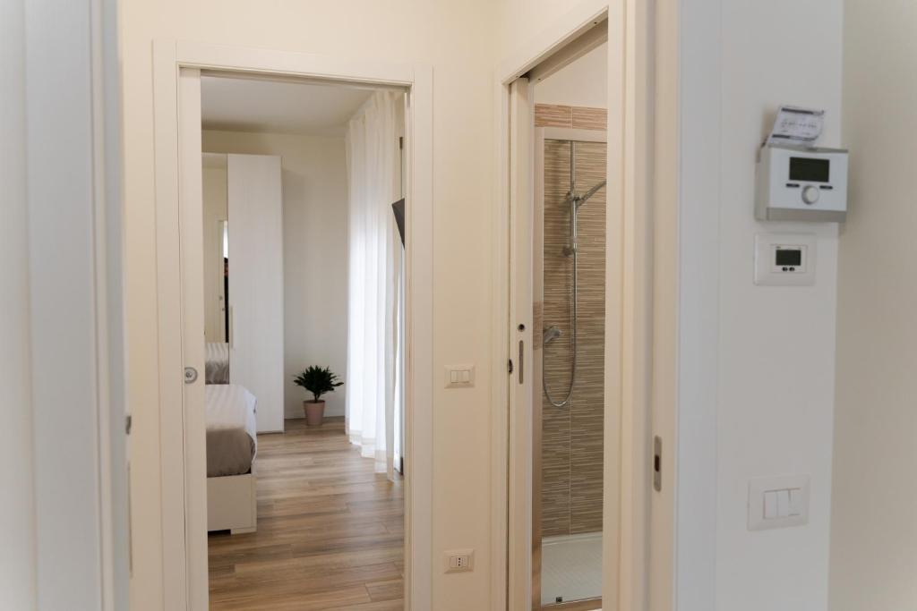 Postel nebo postele na pokoji v ubytování ComfortHome Fiera