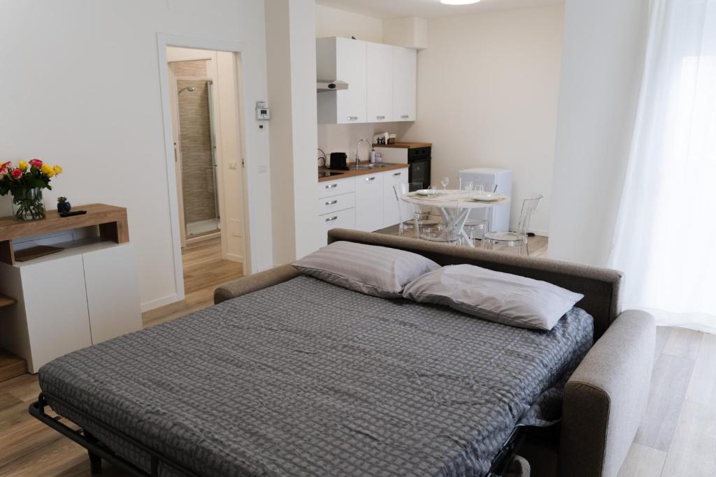 Postel nebo postele na pokoji v ubytování ComfortHome Fiera