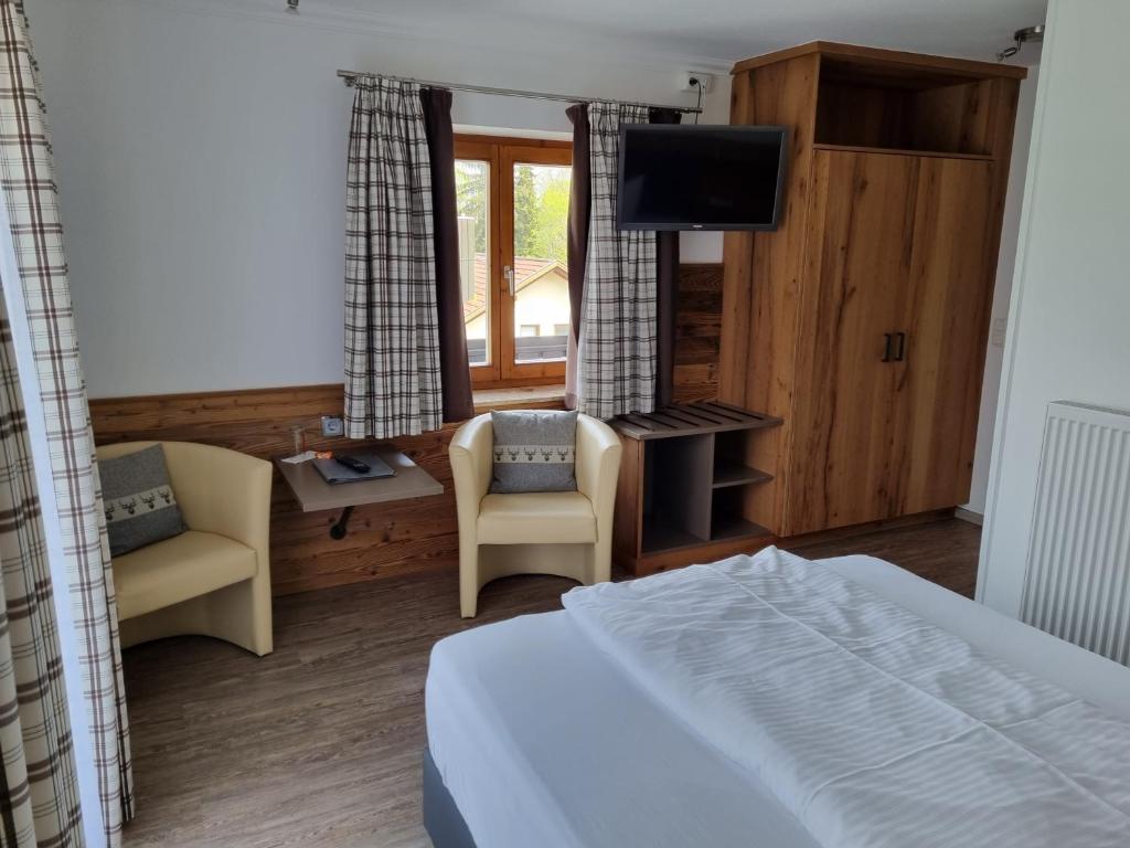 Postel nebo postele na pokoji v ubytování Hotel Beinbauer