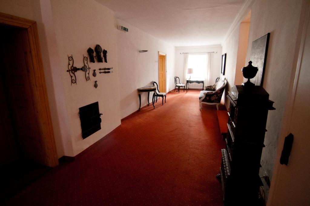 Televízia a/alebo spoločenská miestnosť v ubytovaní Appartements Greier