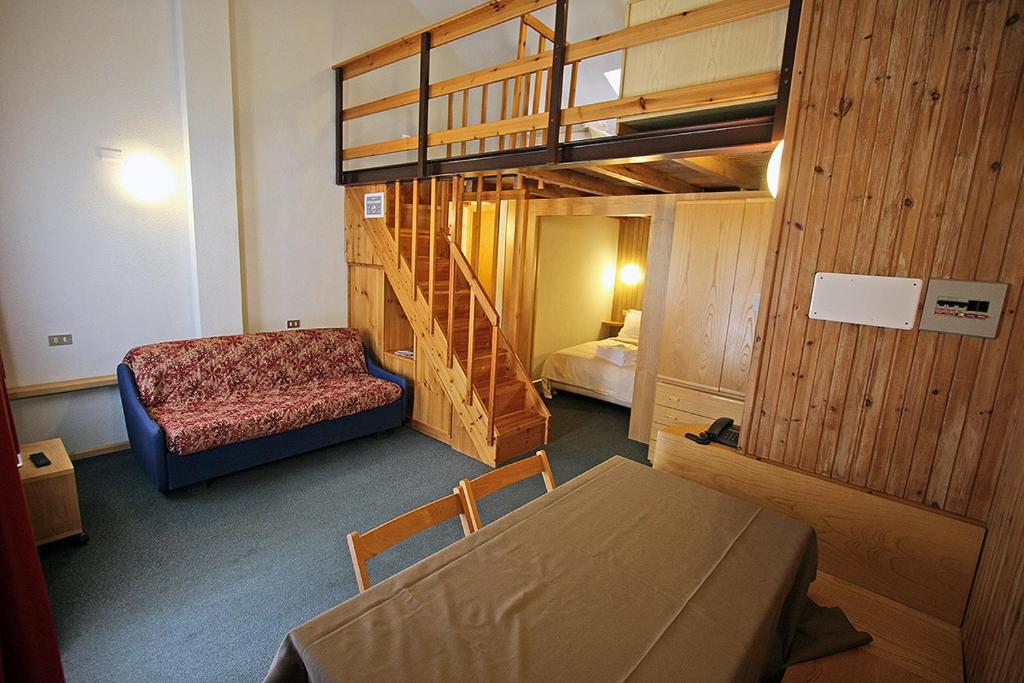 Posteľ alebo postele v izbe v ubytovaní Residence Les Coupoles
