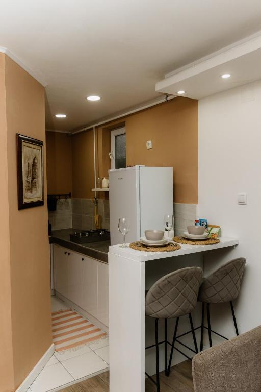 Η κουζίνα ή μικρή κουζίνα στο Guest House LILA