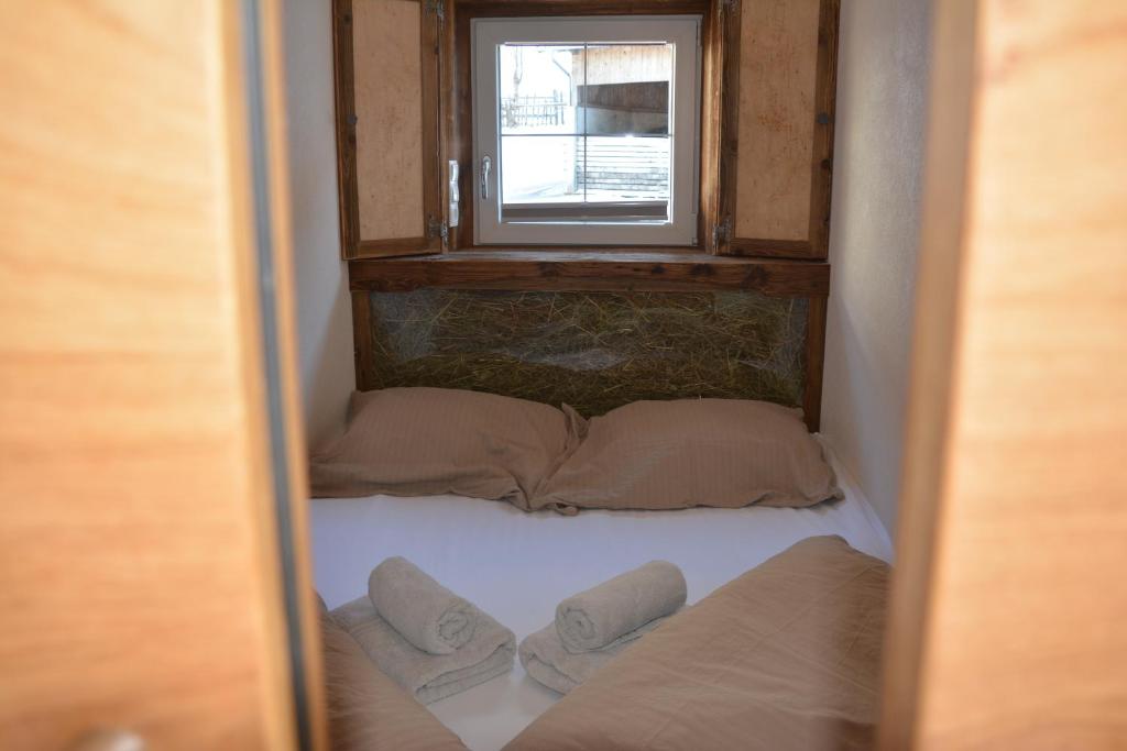 Postel nebo postele na pokoji v ubytování Untersillerhof