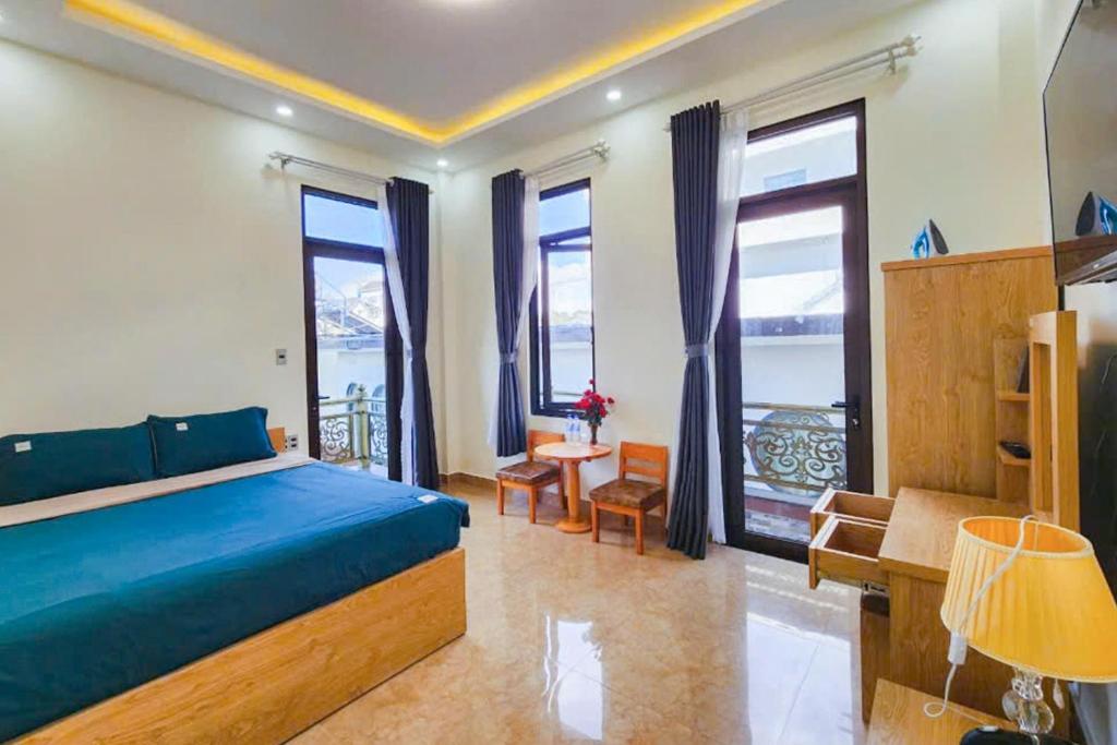 Giường trong phòng chung tại Mai DiaMond Hotel